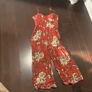 Orange-ish red jumpsuit with flowers
